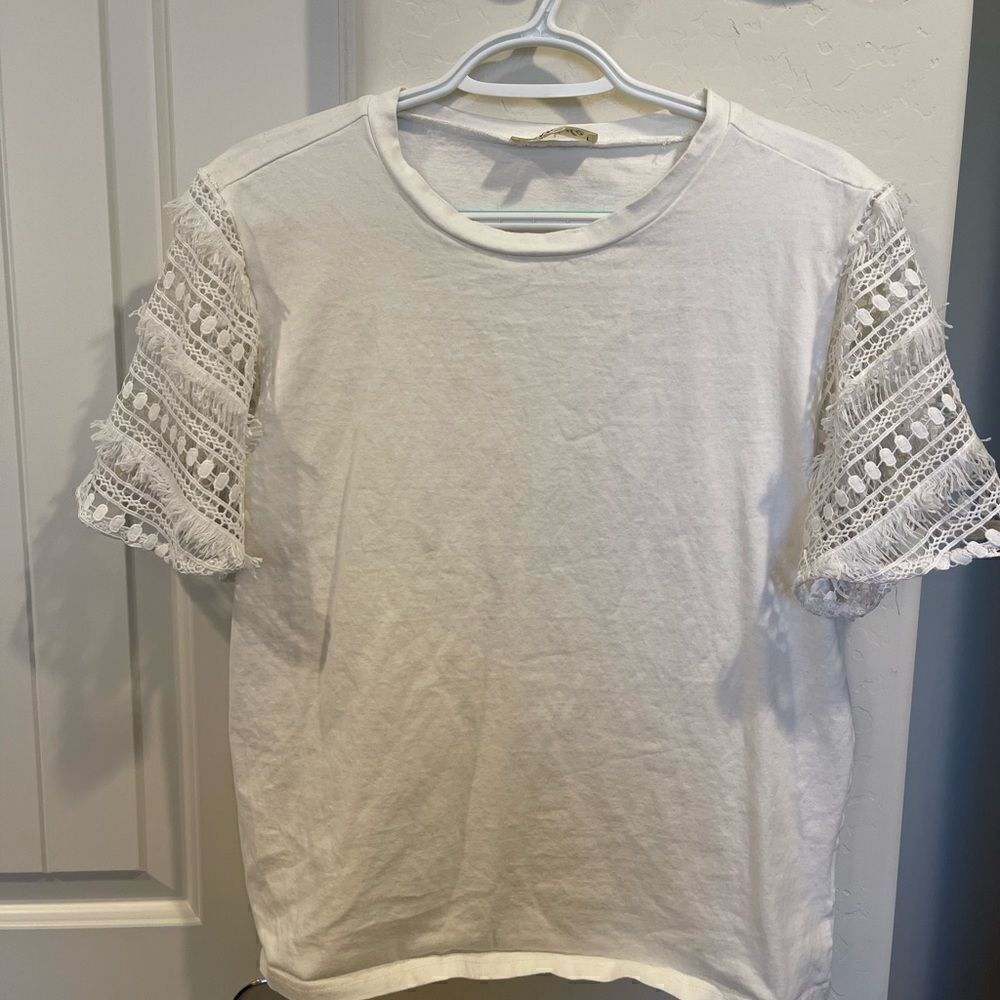 Listicle White T-shirt with crochet sleeves. Soft t-shirt material. Never worn.